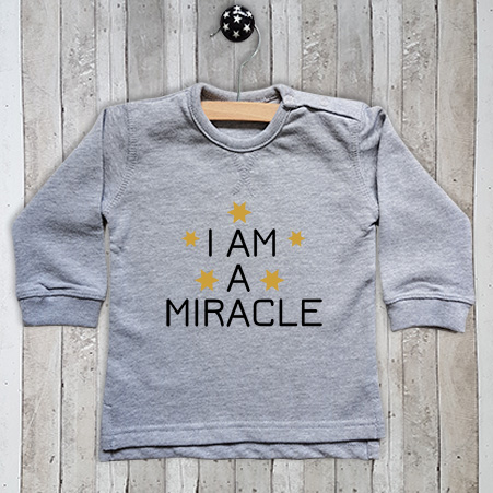 Sweater met tekst I am a miracle
